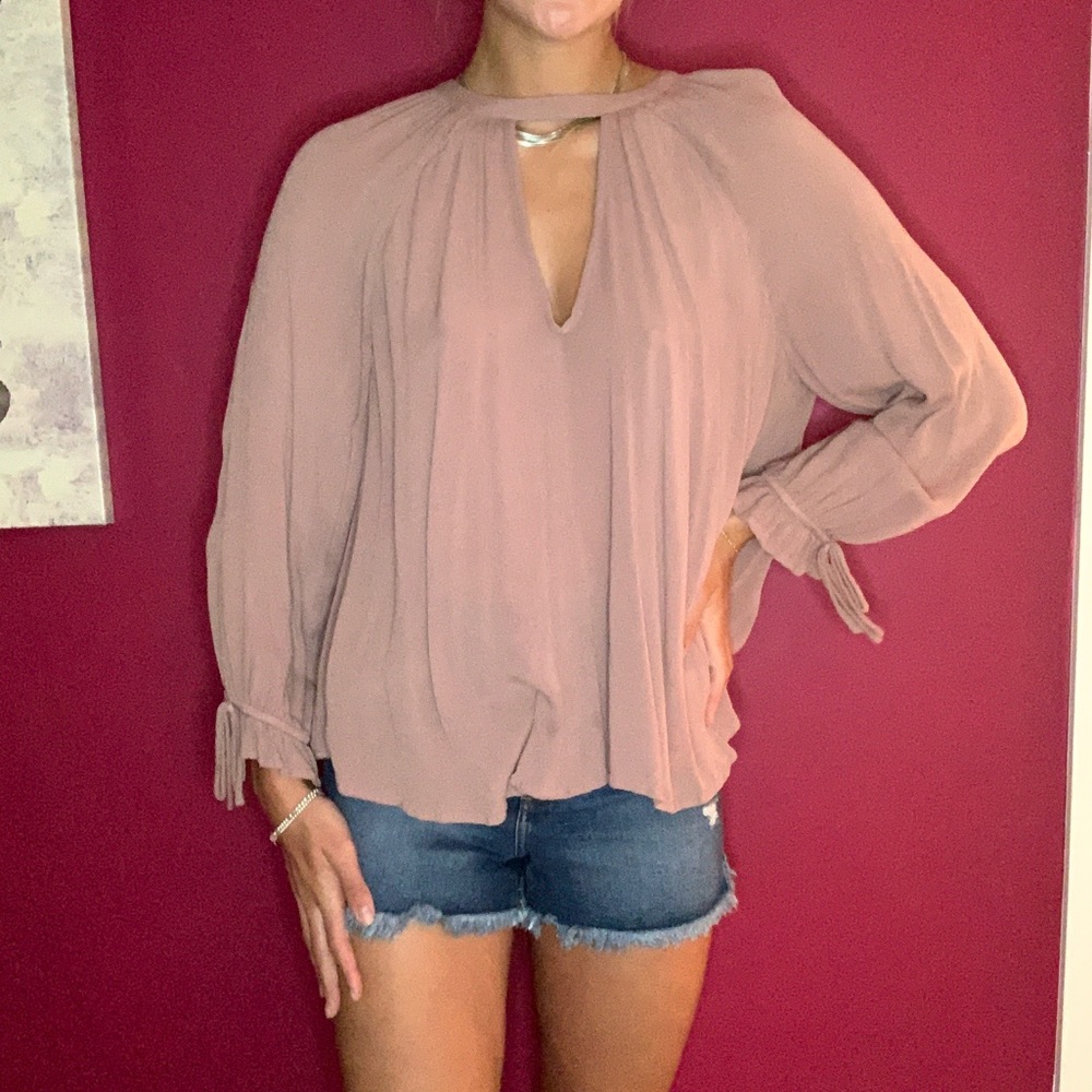Mauve colored blouse